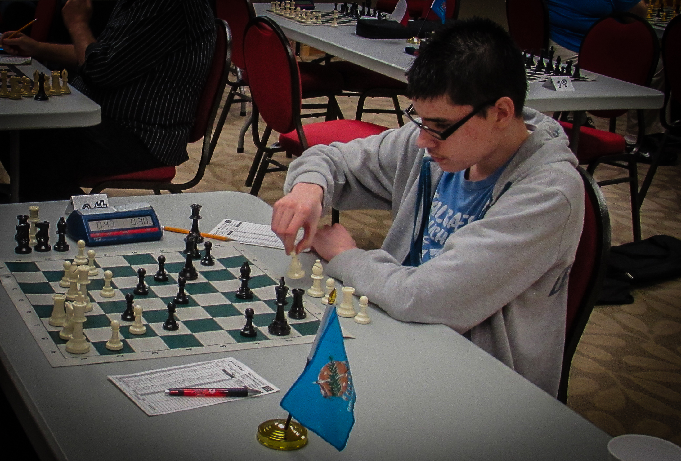 Lawton's Jayden Dewbre played in the Murray County Open and then played a couple of Extra Rated games with a G/30 time control.  By the end of the day he had scored 2.5/4.0 and gained 22 rating points.  He is ranked in the 73rd Percentile for all USA chess players and in the 87th Percentile for all USA Juniors  Photo by Mike Tubbs.